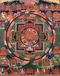 "Painted_17th_century_Tibetan_'Five_Deity_Mandala',_in_the_center_is_Rakta_Yamari_(the_Red_Enemy_of_Death)_embracing_his_consort_Vajra_Vetali,_in_the_corners_are_the_Red,_Green_White_and_Yellow_Yamari.jpg" by User:Wmpearl