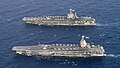 "USS_Gerald_R._Ford_(CVN-78)_and_USS_Harry_S._Truman_(CVN-75)_underway_in_the_Atlantic_Ocean_on_4_June_2020_(200604-N-BD352-0199).JPG" by User:Cobatfor