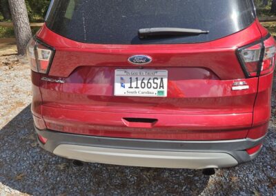 Zelig Williams red Ford Escape