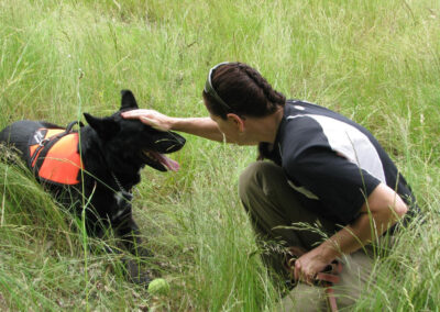 Detective Jackie Nichols with her cadaver dog, Raven.
