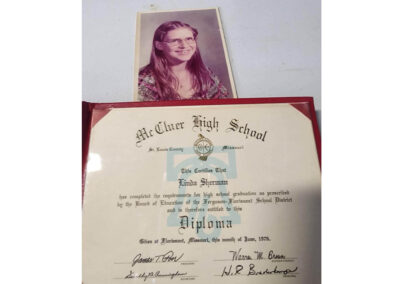 Linda in her senior year at McCluer High School and her diploma, 1976.